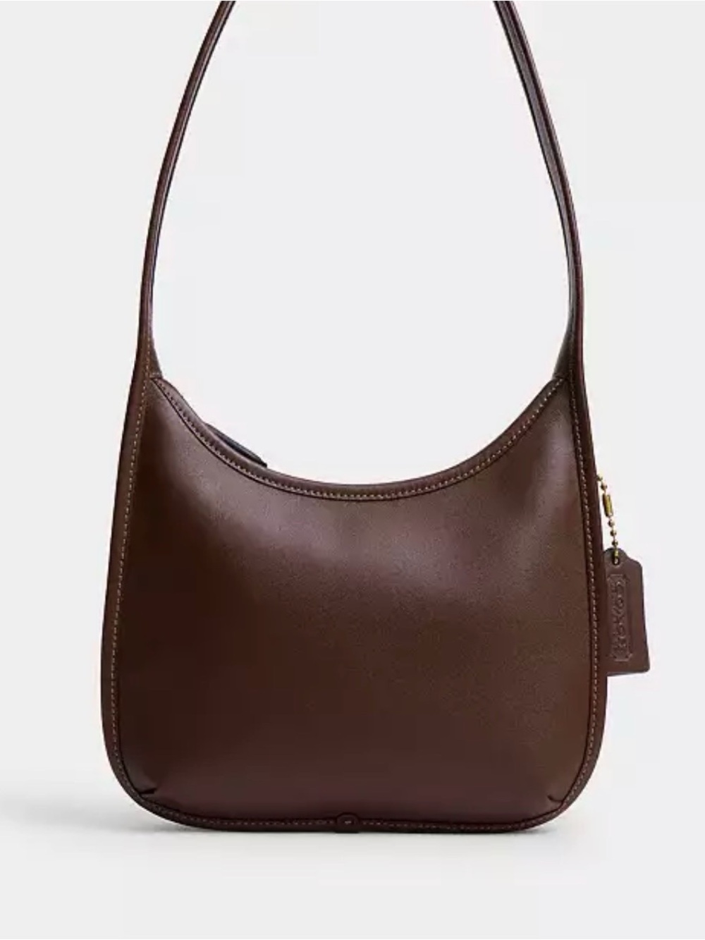 NWT Coach Curve Zip Bag in Maple.